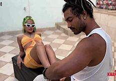 Brunette gives footjob and gets messy