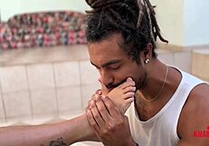 Brunette gives footjob and gets messy