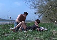 The short-haired tattooed milf gives a blowjob and gets fucked outdoors by her lover.