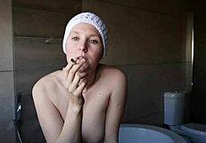 cute brunette smoking with big tits