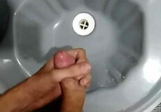 Jerking off in the bathroom after the soccer game