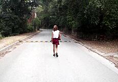 She explores the forest looking for a secluded spot