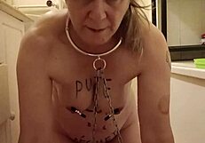 This 2024 BDSM slave endures pissing and belting in a humiliating outdoor scene