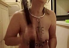 This 2024 BDSM slave endures pissing and belting in a humiliating outdoor scene