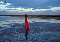 Walking in red sunset at Elton Salt Lake.