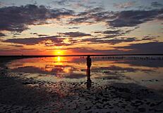 Walking in red sunset at Elton Salt Lake.