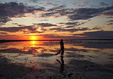 Walking in red sunset at Elton Salt Lake.