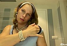 The neighbor mom teasing with her big tits in striptease