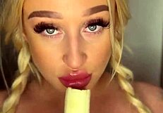 horny college girl sucks banana