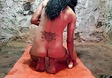 The shemale takes a dildo punch in her big ass