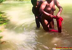 Fucking that African whore in the stream! 🔥