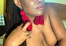 Ebony Babe Fucks Herself with Big Black Tits!