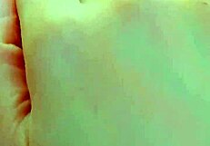 Intensely fingering her strawberry pink shaved pussy to wet orgasm.