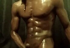 i'm stroking this big black cock with lots of oil, it's so slippery