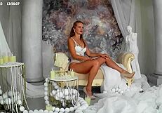 Gorgeous blonde removes white panties on beach