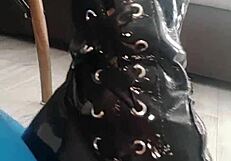 Veve performs balloon popping in latex stockings with a sharp