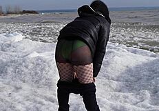 Watch This Milf Pissing In The Sea With Her Hairy Pussy!