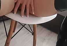 Veve performs balloon popping in latex stockings with a sharp