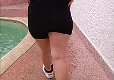 I admire the beautiful Colombian ass in the public pool