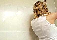 Sapphire the busty blonde gets all wet in the shower