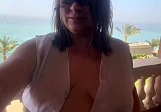 Hairy Pussy On The Outdoor Balcony Masturbates And Orgasms With Squirting