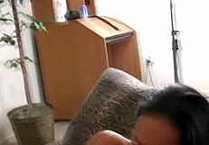 The dark-haired prostitute enjoys her big tits.