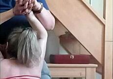 Bound slave endures ice and blowjob