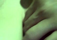 Asian Elderly Woman Showcasing Her Large Breasts