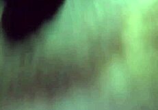 Asian Elderly Woman Showcasing Her Large Breasts