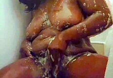 ebony mom sneaks a powerful climax in the bathtub after her shower
