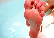 heidy pino, a colombian latina, takes a relaxing shower in her home