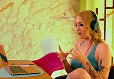 The blonde captive endures rough fisting in tight bondage.