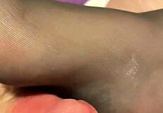 giving hubby a footjob in black toe stockings 😍