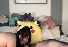 Latino couple playfully engages in intimate activities and makes love tenderly.