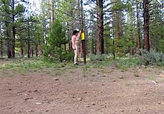 Simscristian05 flashes naked at campground entrance in sheer outfit