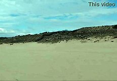 Guy on nude beach spills a lot of milk