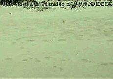 Guy on nude beach spills a lot of milk