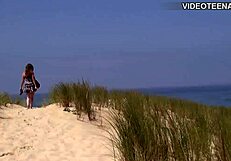 Eighteen-year-old lucie shows her big boobs at the beach