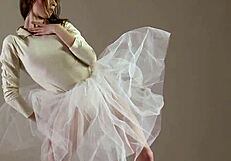 Blonde Gymnast Performs Gymnastics