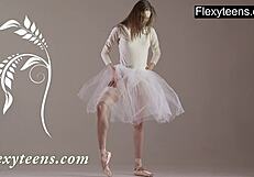 Blonde Gymnast Performs Gymnastics