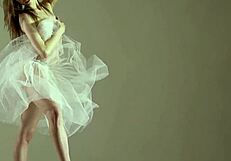 Blonde Gymnast Performs Gymnastics