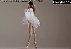 Blonde Gymnast Performs Gymnastics