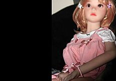 camille the sex doll is modeling in a pink outfit for the photoshoot