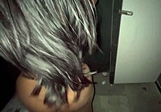 I grind my ass on the black guy's cock and he cums in my hand at the glory hole.