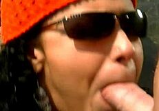 Mature Man Fucks Exotic Babe in Cap and Sunglasses on Seaside Stones.