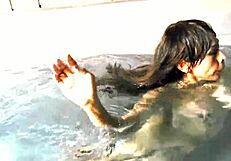 Vrpussyvision com features an asian milf masturbating outdoors in a swimming pool with fingering and orgasm