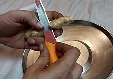 Applying Ginger To Submissive's Anus For First Time Figging Training