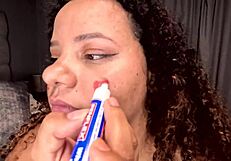 BBW girl deepthroats dildo after writing dirty words on her face!