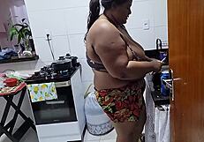 Chubby stepmother with big tits fucked by stepson in kitchen