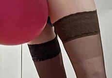 In the dungeon, mistress elza kom worships balloons with her sexy curves and domination skills